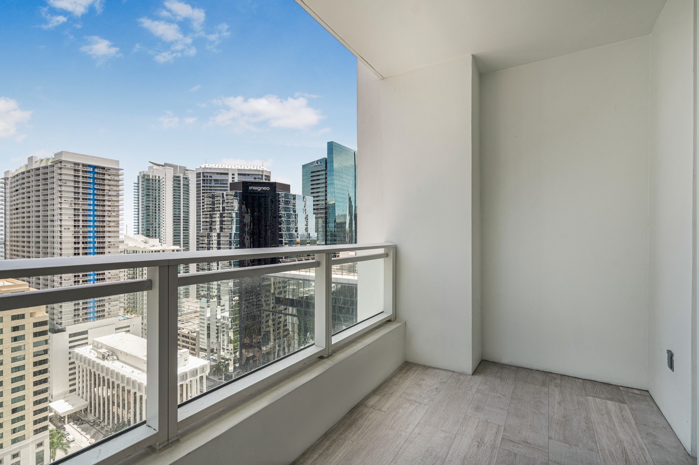 High-rise balcony view of Miami skyline