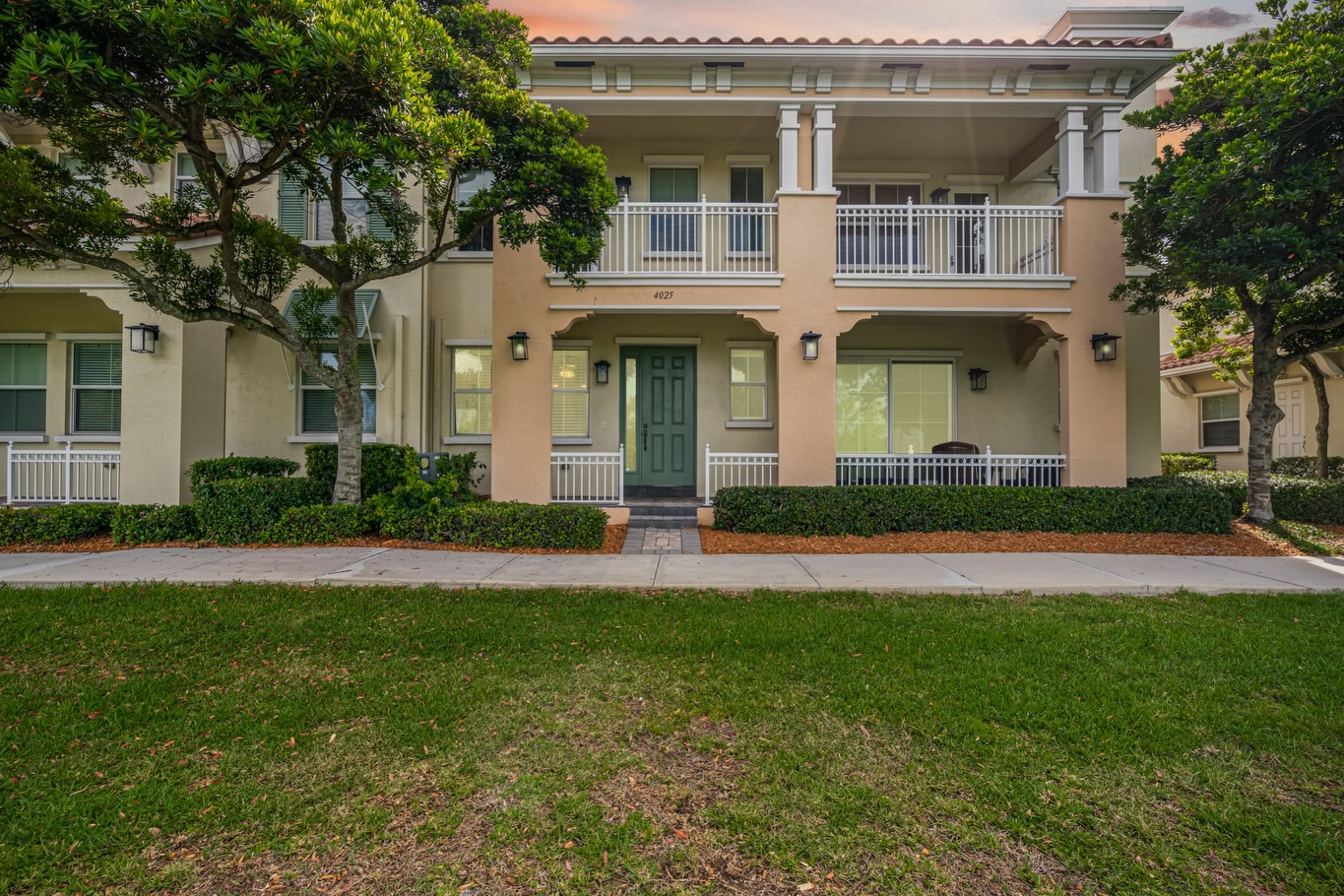 Florida townhouse exterior photographed at twilight